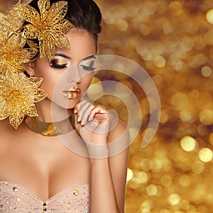 Fashion Beauty Girl portrait with flowers Isolated on golden