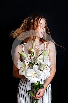 Fashion Beauty Model Girl with Flowers Hair. Perfect natural Make up and Hair Style