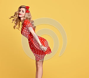 Fashion Beauty.PinUp Girl Smiling.Polka Dots Dress