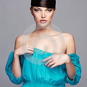 Fashion Beauty Portrait.healthy Hair. Beautiful Girl in blue dress