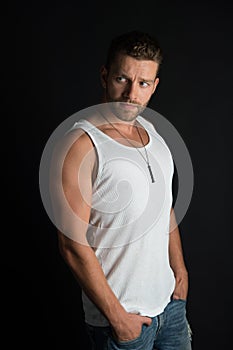 Fashion and beauty. Style and look, barber. Man with unshaven face in studio. Handsome mucho guy in vest. Fashion model photo