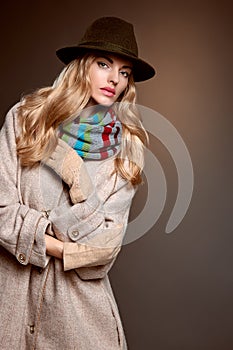 Fashion beauty woman in stylish coat hat, autumn