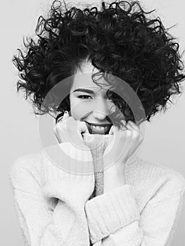 Fashion black and white portrait of beautiful asian woman in white pullover