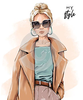 Fashion blond hair woman. Beautiful girl in sunglasses. Stylish girl in coat. Fashion look.