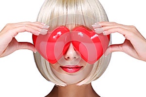 Fashion Blonde Girl with Red Hearts in Valentines Day. Glamorous