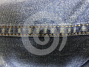 Fashion blue jean denim clothes textile pant. Clothing background fabric garment material apparel cotton. Wear texture cloth close