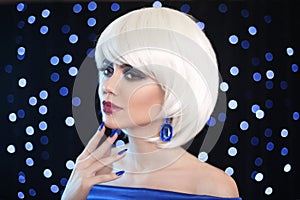 Fashion Bob Blond Girl. Beauty makeup Portrait Woman. White Short Hair. Gems jewelry earrings. Face Close up. Hairstyle. Fringe.