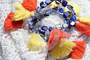 Fashion bracelets on wool scarf