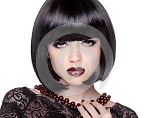 Fashion Brunette Girl model with Black bob hairstyle. Lady vamp.