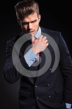Fashion business man in a provocative pose