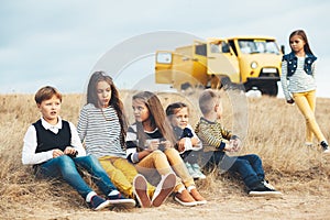 Fashion children in autumn field