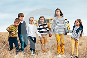 Fashion children in autumn field