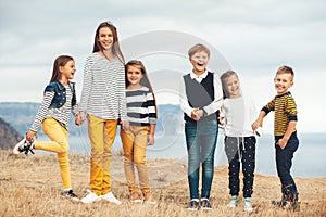 Fashion children in autumn field