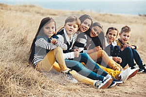 Fashion children in autumn field