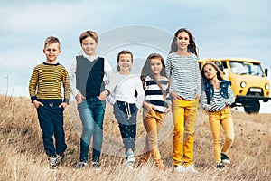 Fashion children in autumn field