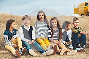 Fashion children in autumn field