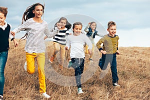 Fashion children in autumn field