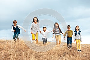 Fashion children in autumn field