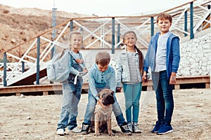 Fashion children on the sea shore