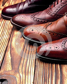 Fashion classical polished men`s shades of brown oxford brogues.Selective focus