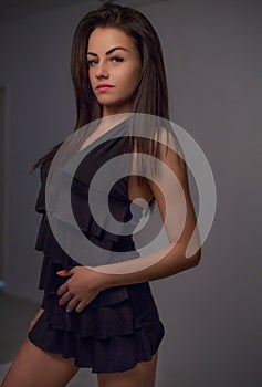 Fashion close up portrait of young beautiful brunette woman