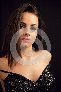 Fashion close up portrait of young beautiful brunette woman photo