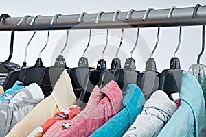 Fashion clothes on clothing rack ,colorful closet