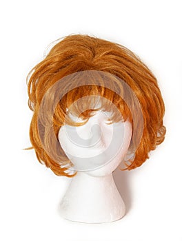 Fashion color wig on white background photo