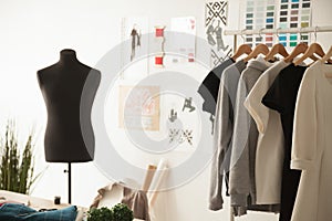 Fashion design cozy studio interior with dummy, dressmaking and
