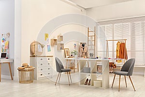 Fashion designer`s workplace. Creating new clothes
