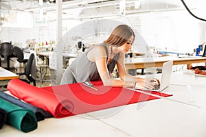 Fashion designer working in a factory