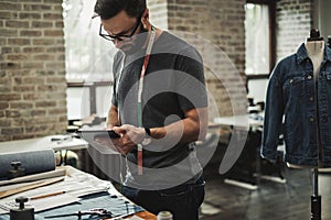 Fashion designer working in his studio