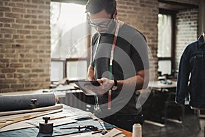 Fashion designer working in his studio