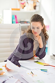 Fashion designer working in office