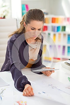 Fashion designer working in office