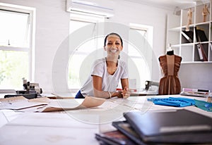 Fashion designer, workshop and portrait of business woman in office for design, retail and startup career. Professional