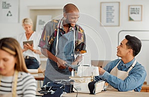 Fashion designers, colleagues and men sewing clothes in a workshop. Happy, diverse and smiling young creatives planning