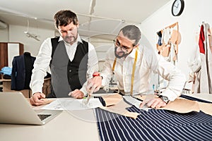 Fashion designers working on new male collection