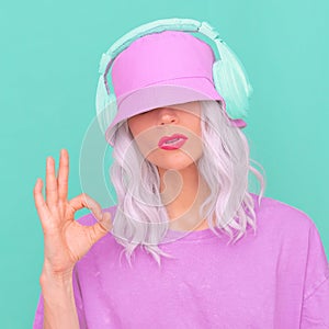 Fashion Dj Girl in stylish headphones and bucket hats. Minimal monochrome pastel colours design trends