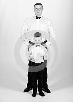 Fashion expert. tuxedo style. father and son in formal suit. happy child with father. business meeting party. little boy