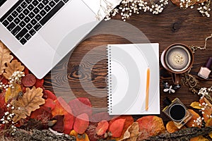 Fashion female accessories Set. autumn leaves, paper notebook and laptop