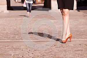 Fashion. Female legs in stylish shoes outdoor