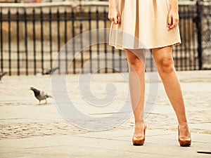 Fashion. Female legs in stylish shoes outdoor