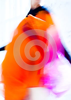 Fashion girl in abstract color fashion orange