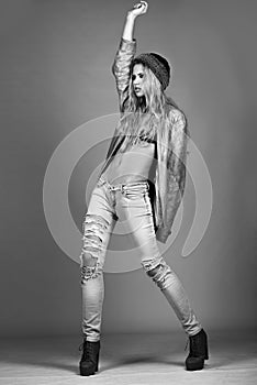 Fashion girl model posing on white background in the studio