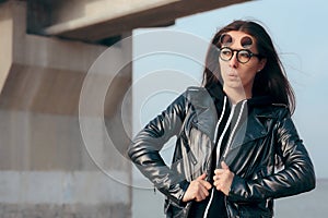 Fashion Girl with Steampunk Flip Up Glasses and Leather Jacket