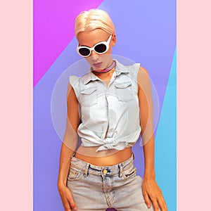 Fashion Girl in summer stylish denim outfit. Sunglasses and Choker trends