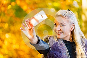 Fashion girl take selfie photo in autumn park