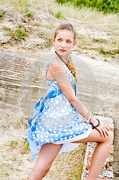 Fashion girl urbex location blue polka dress photo