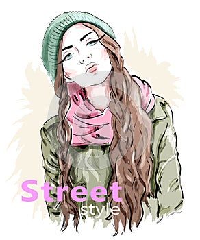 Fashion girl wearing modern knit cap and jacket. Street style clothes. Sketch. photo